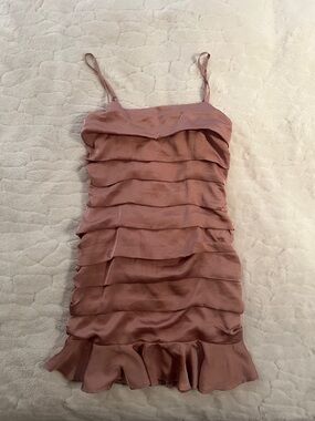Row A mini dress featuring a prominent multi-tiered ruffled design ,dusty pink L